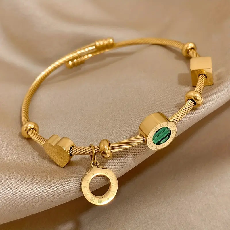 Rhian – Goldenes Signaturarmband