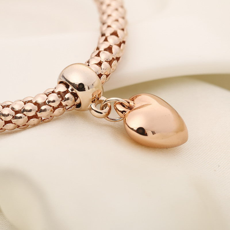 Aria – Metallarmband mit festen Herzen