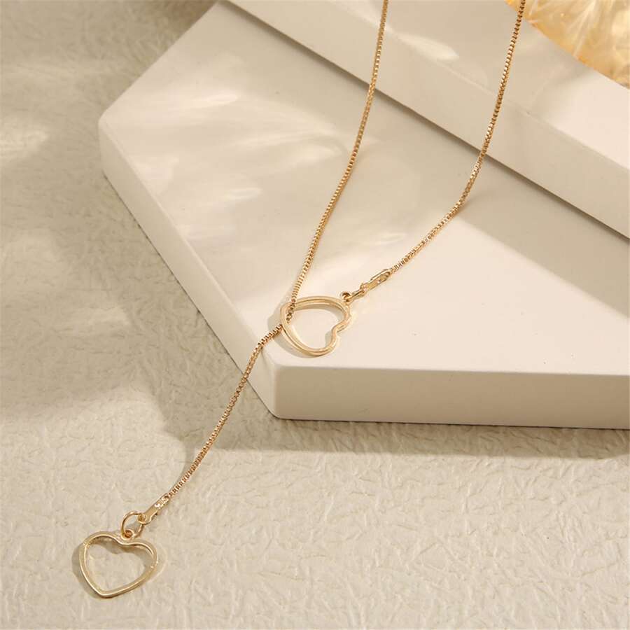 Herz-Tropfen-Halskette - Goldene Tropfen-Halskette mit 2 Herzen
