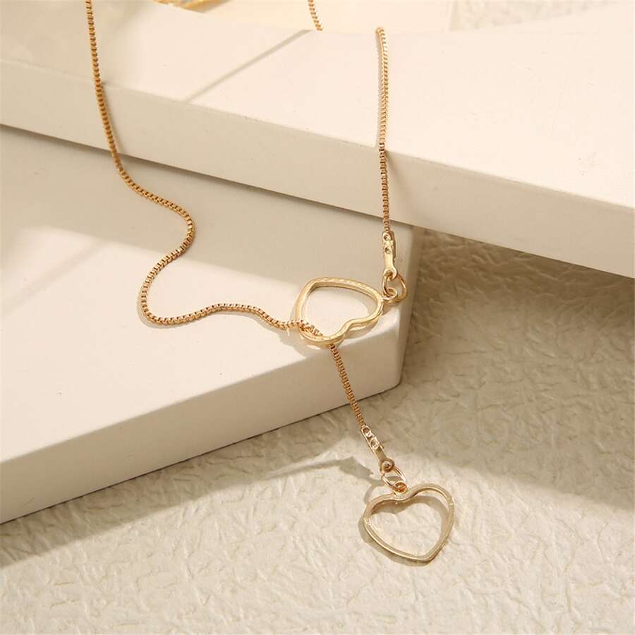 Herz-Tropfen-Halskette - Goldene Tropfen-Halskette mit 2 Herzen