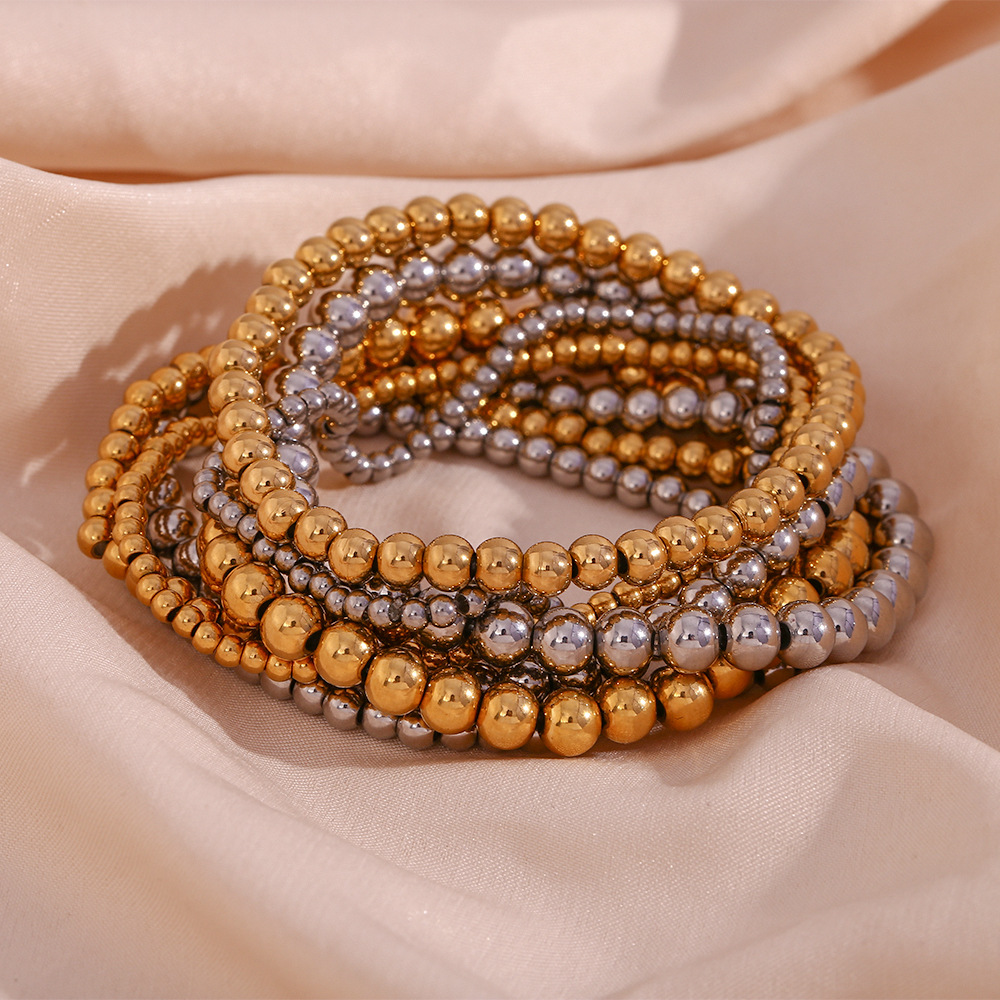 Crea - Modisches stapelbares goldenes Metallarmband (4mm)