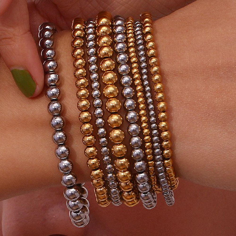 Crea - Modisches stapelbares goldenes Metallarmband (4mm)