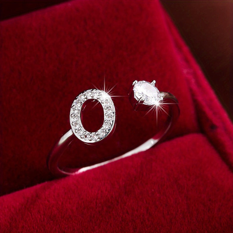 Nova – Moderner offener Ring mit Initiale und Zirkonia