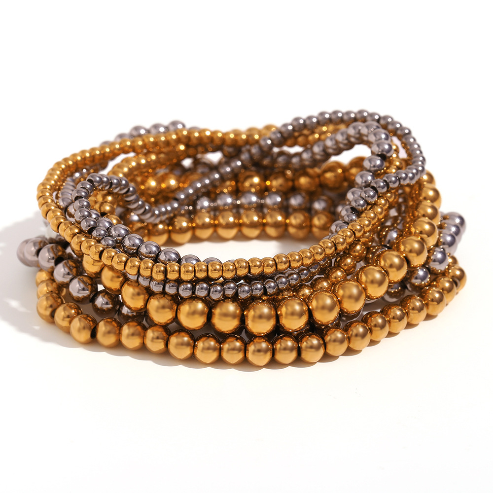 Crea - Modisches stapelbares goldenes Metallarmband (4mm)