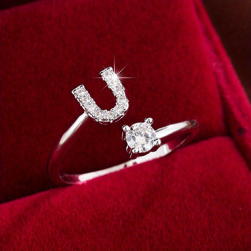 Nova – Moderner offener Ring mit Initiale und Zirkonia