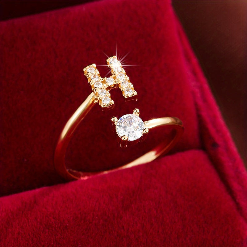 Nova – Moderner offener Ring mit Initiale und Zirkonia