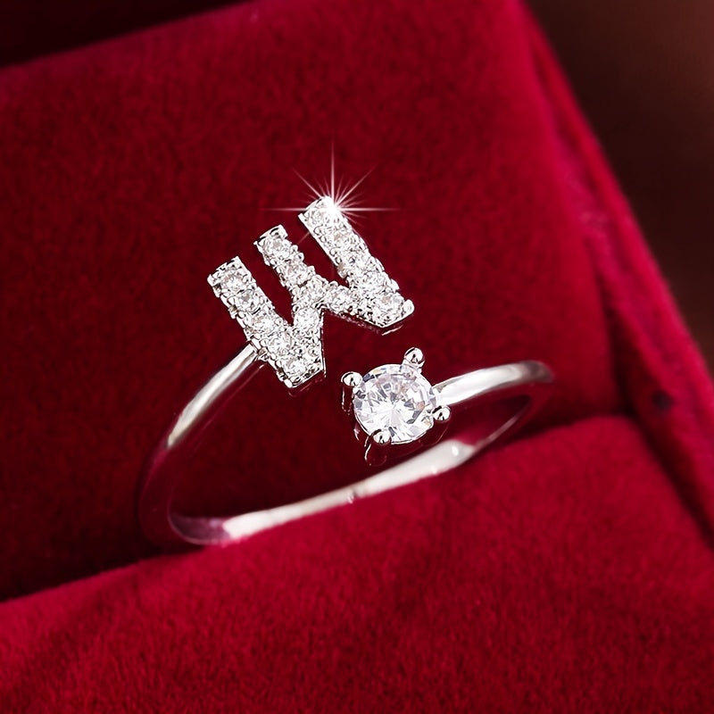 Nova – Moderner offener Ring mit Initiale und Zirkonia