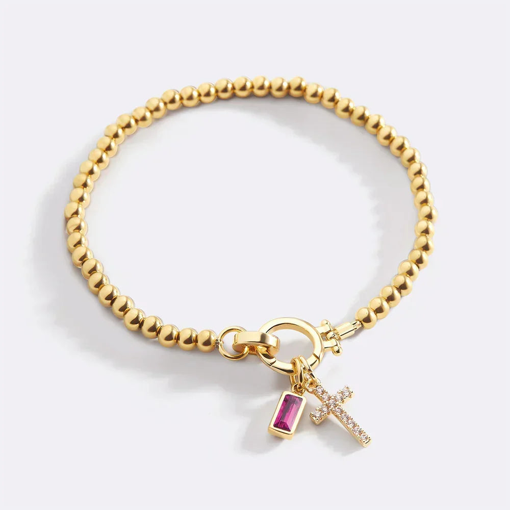 Eli – Geburtssteinarmband mit Kreuzanhänger