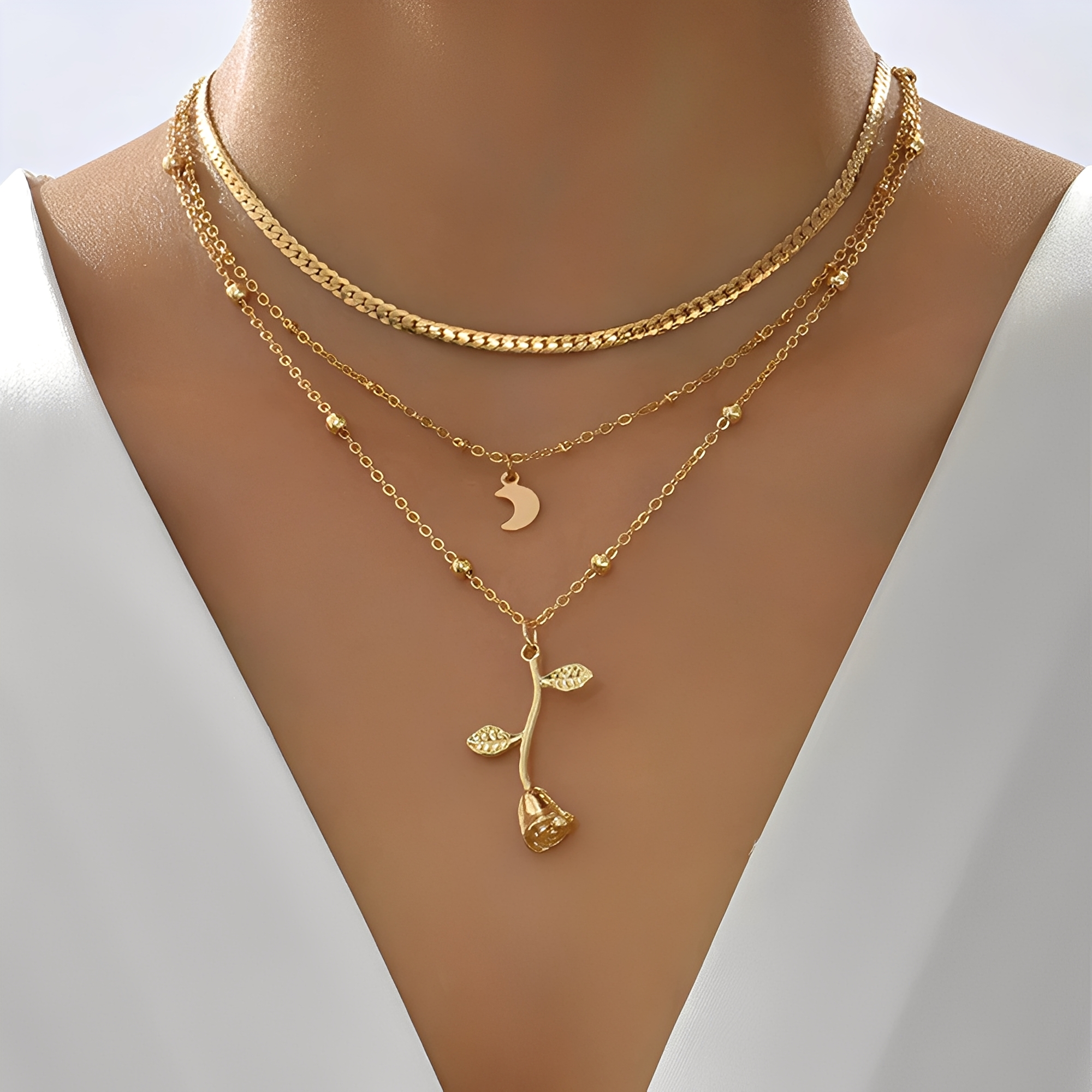Sylvia – Kette mit rosa Anhänger und Mond aus Gold