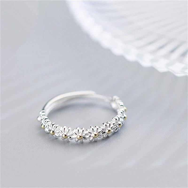 Flavia – Verstellbarer Ring mit emaillierter Margerite aus Silber