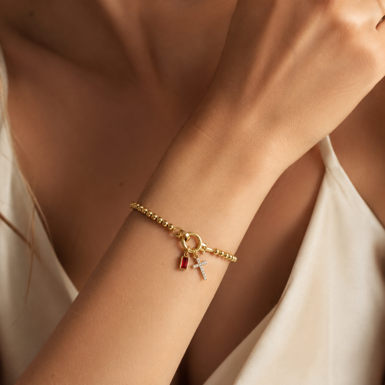 Eli – Geburtssteinarmband mit Kreuzanhänger