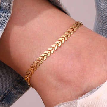 Sisi – Fußarmband mit goldenen Blättern