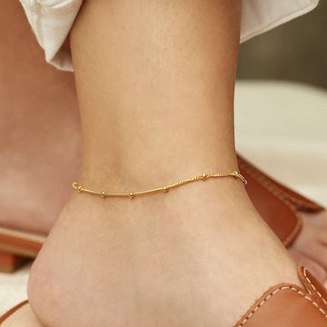 Wren – Elegante Goldkette für den Knöchel