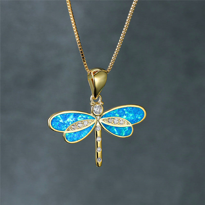 Maggie – Goldene Libellenhalskette mit Opal