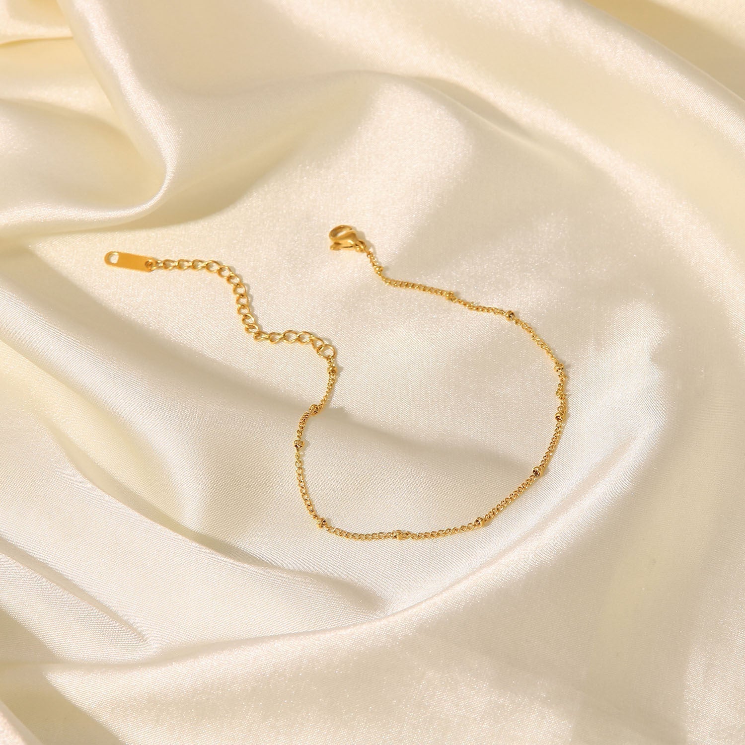 Maricel – Goldene Fußkette