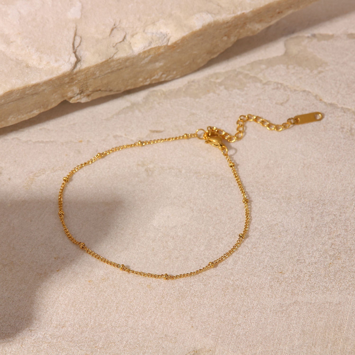 Maricel – Goldene Fußkette