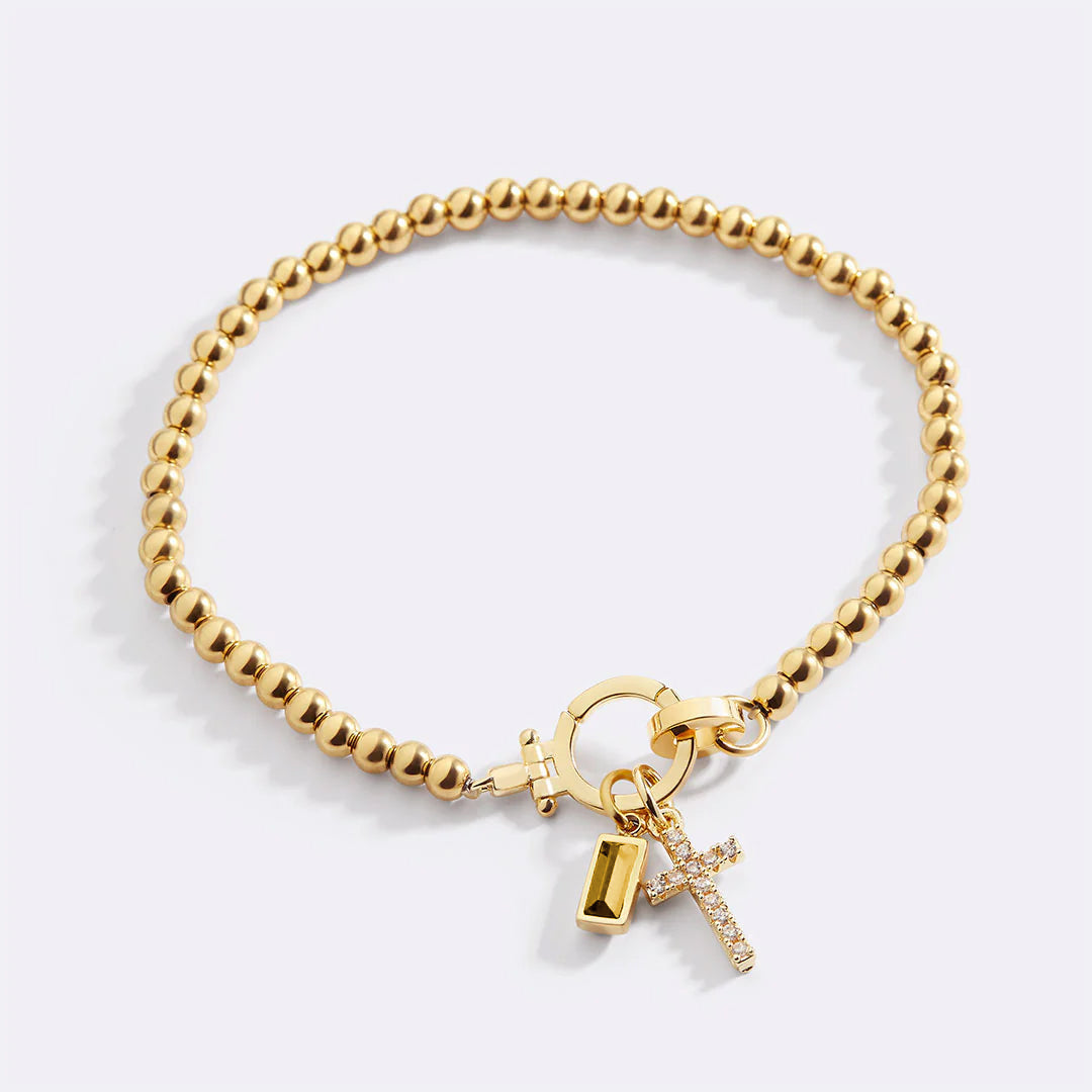 Eli – Geburtssteinarmband mit Kreuzanhänger
