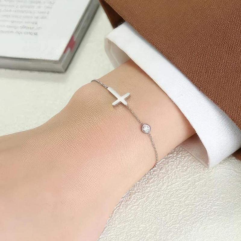 Althea – Damenarmband mit Kreuz aus Gold und Silber