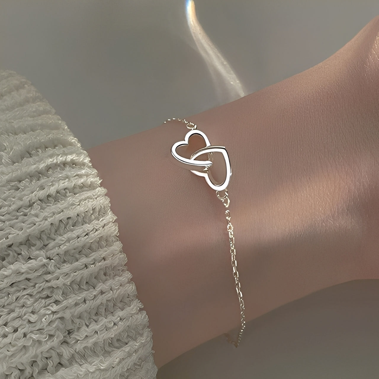 Amara – Amulettarmband mit doppeltem Herz