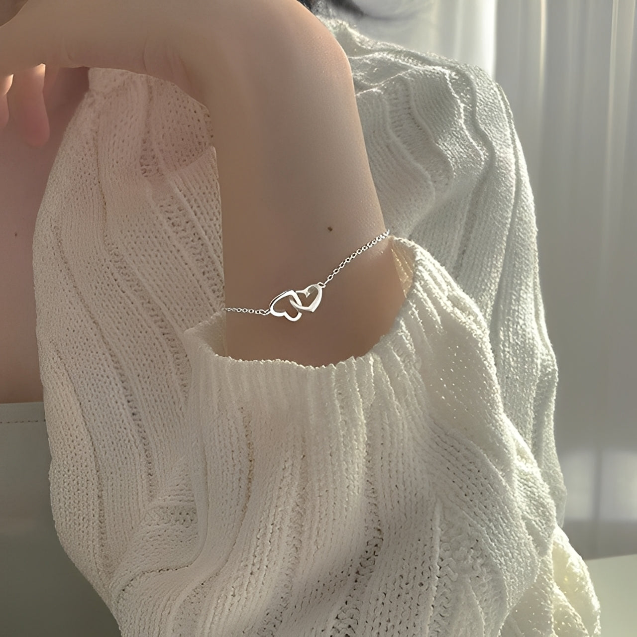Amara – Amulettarmband mit doppeltem Herz