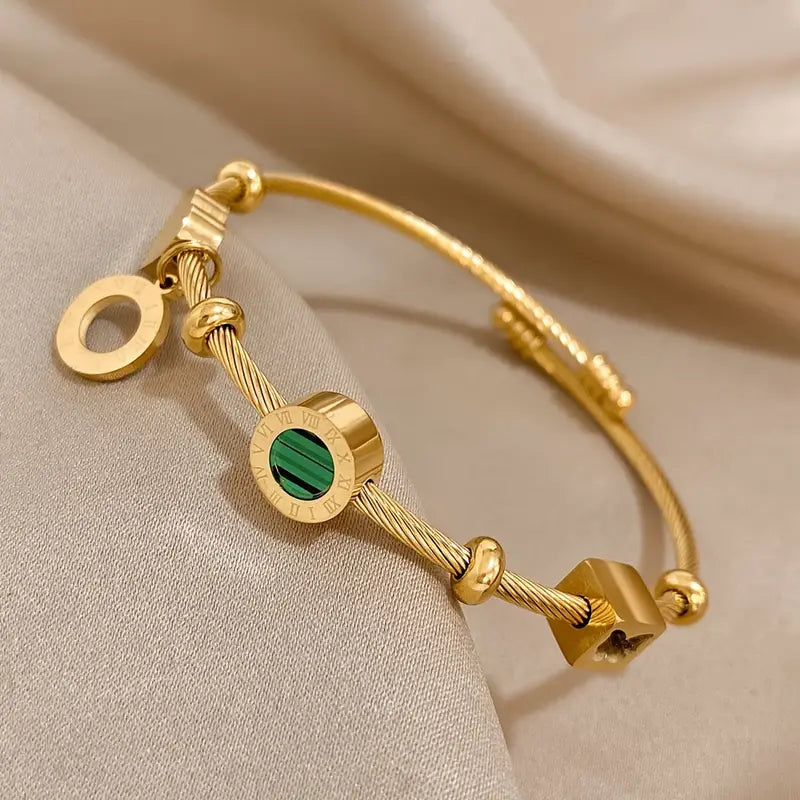 Rhian – Goldenes Signaturarmband