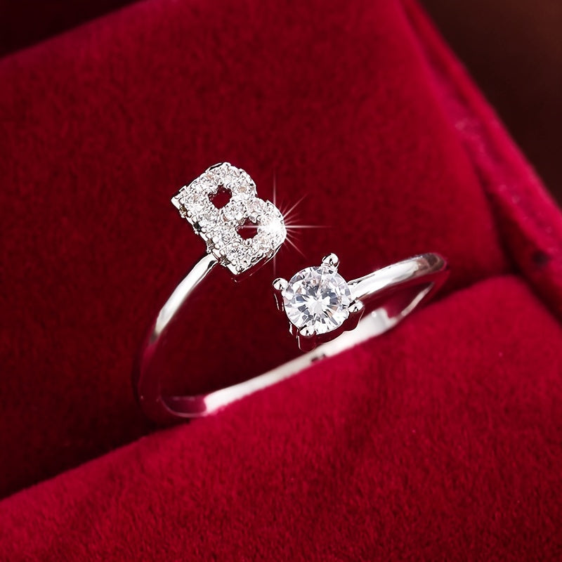 Nova – Moderner offener Ring mit Initiale und Zirkonia