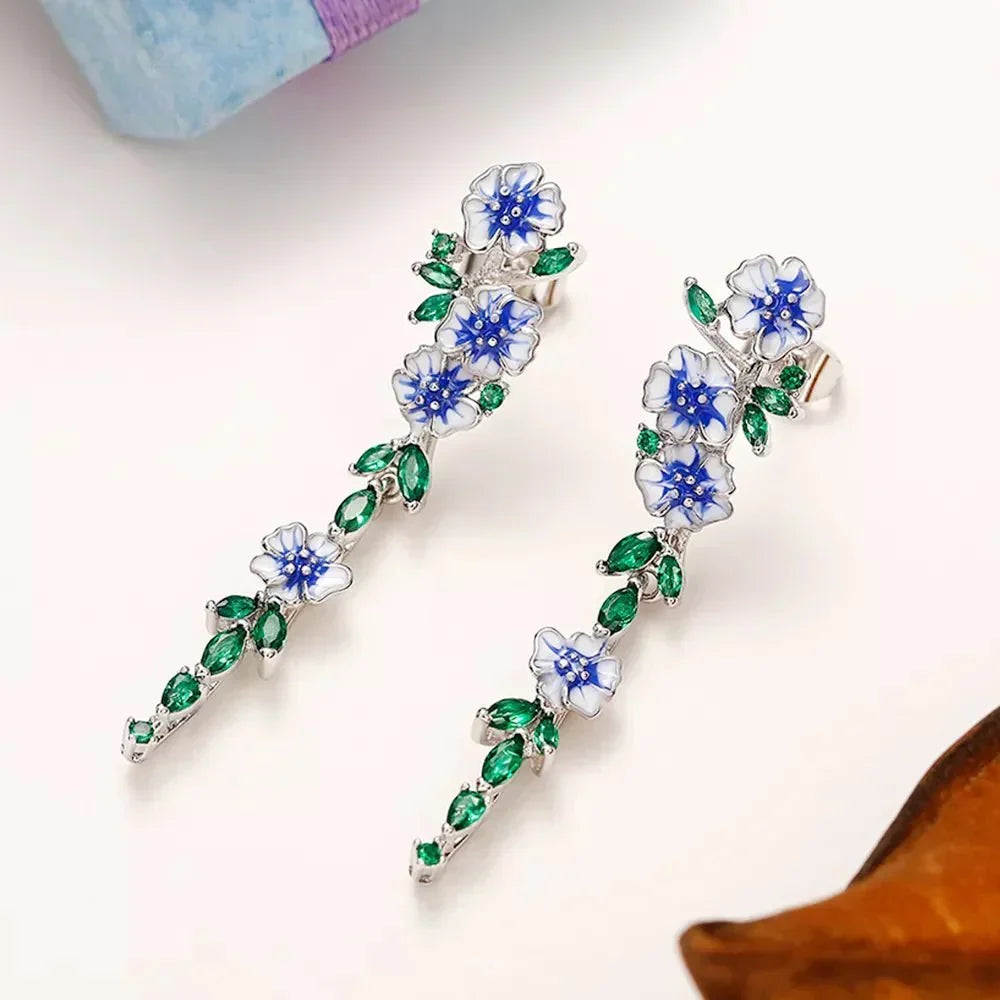 Yara – Hängende Ohrringe mit blauen Blumen