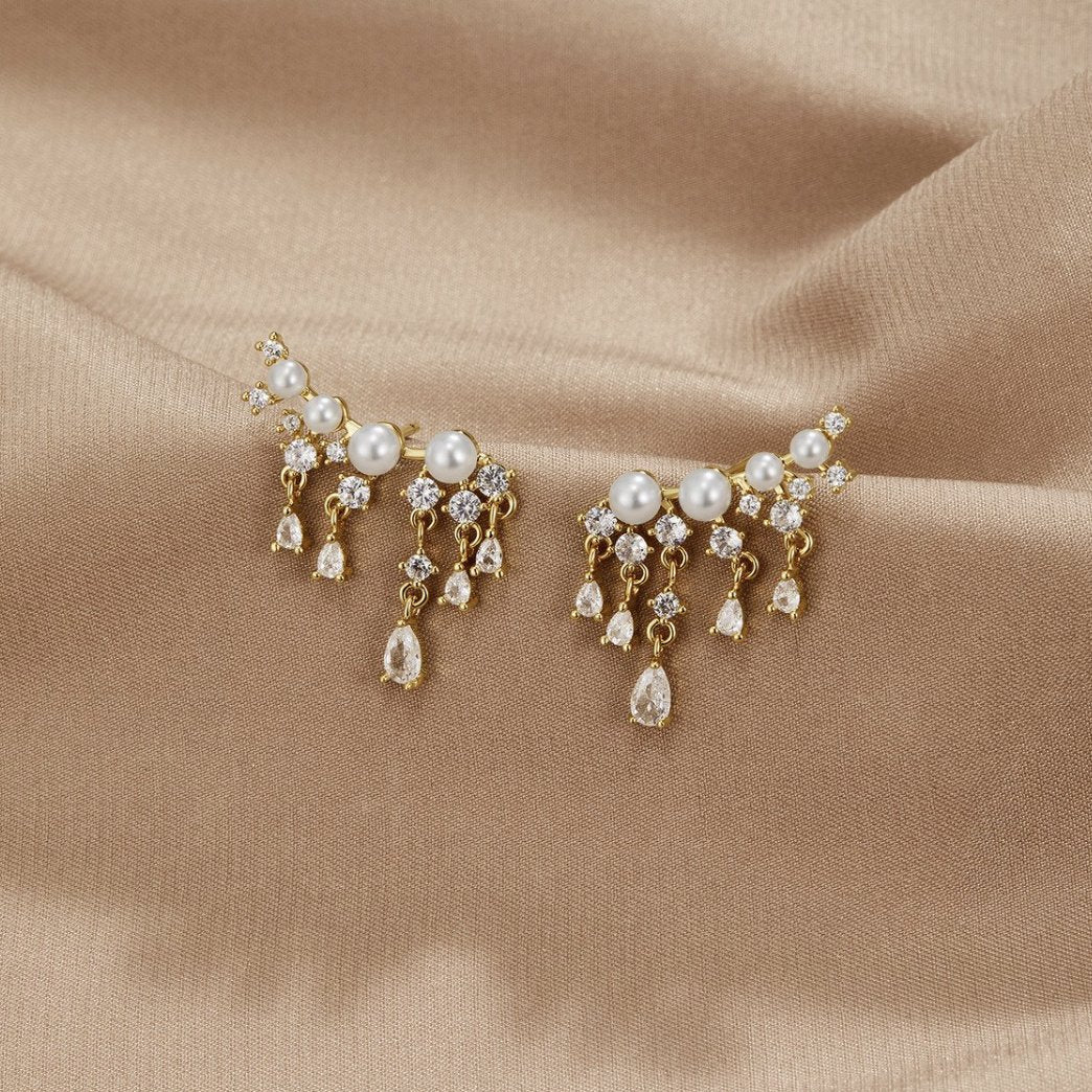 Fenia - Goldene Perlenohrringe mit Quasten