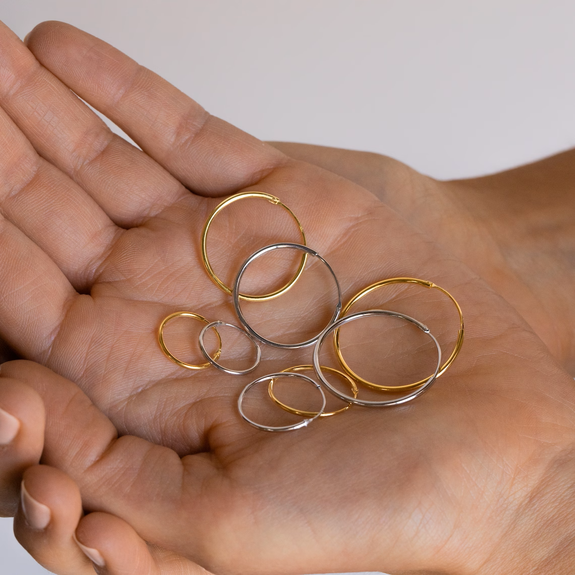 Leichte Ringe - Ohrringe aus Gold und Silber (Set von 4)