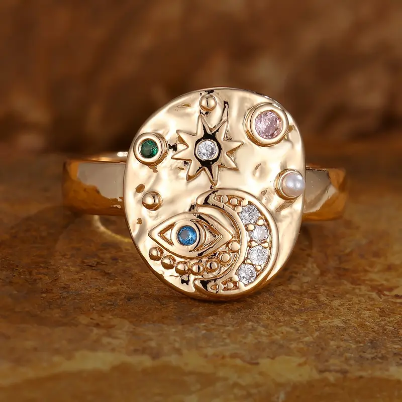 Solenya – Kristallring in Gold mit Sonnen-Mond-Motiv