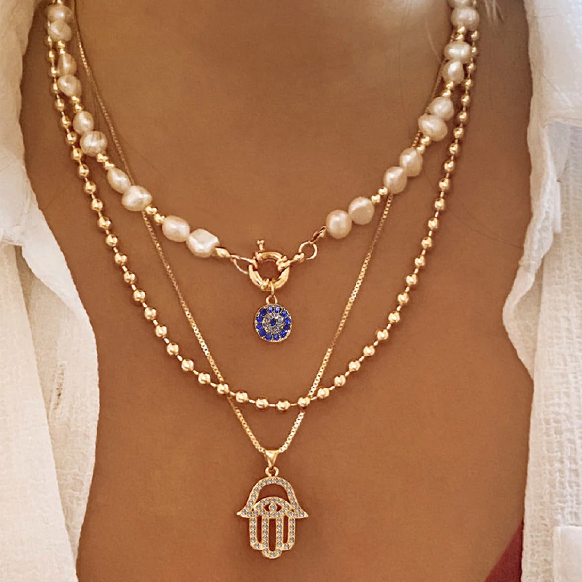 Jade – Mehrstufige Perlenhalskette mit Hamsa