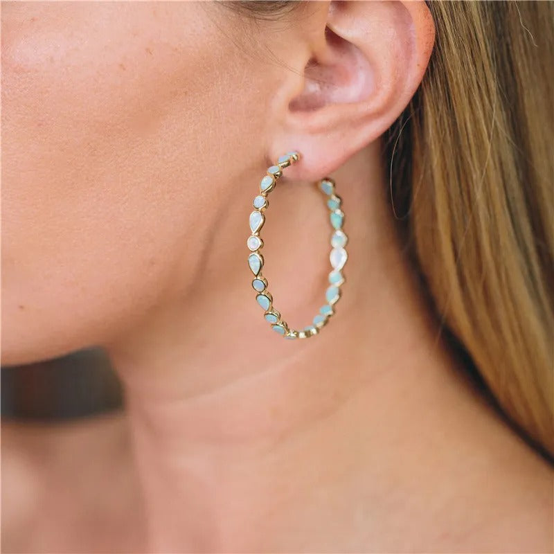 Raya – Vintage-goldene Creolen mit blauem Opal
