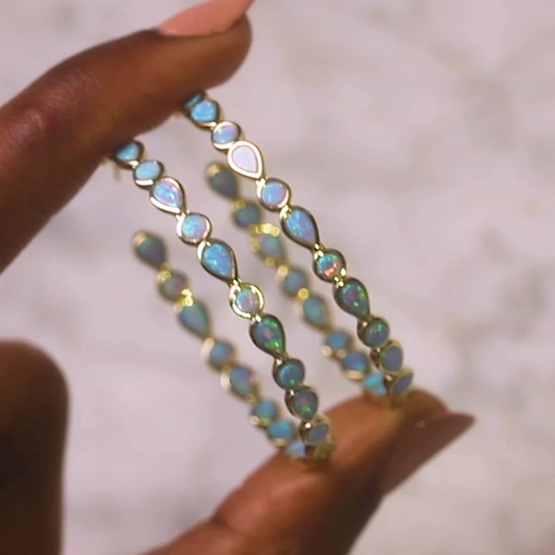 Raya – Vintage-goldene Creolen mit blauem Opal