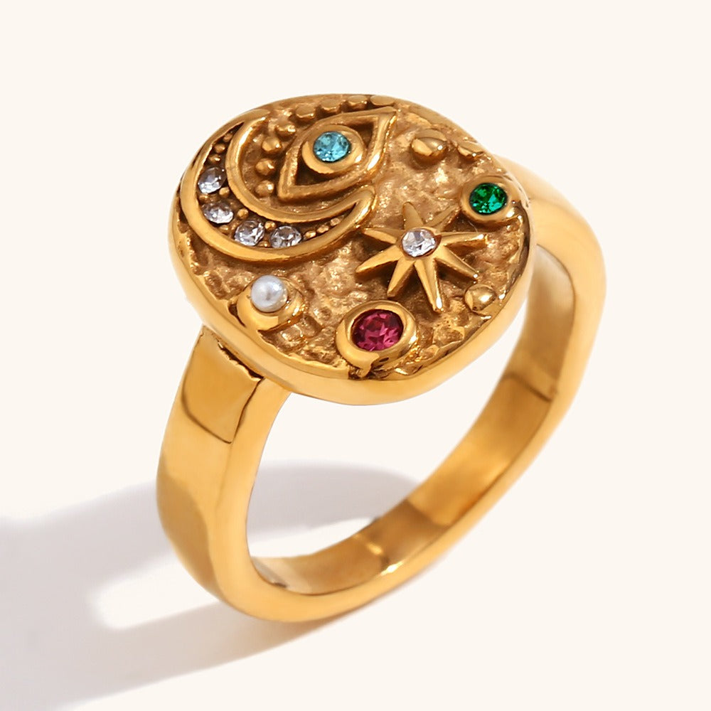 Solenya – Kristallring in Gold mit Sonnen-Mond-Motiv